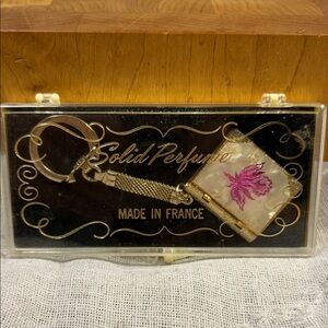 Solid Perfume made in France mother of pearl keychain